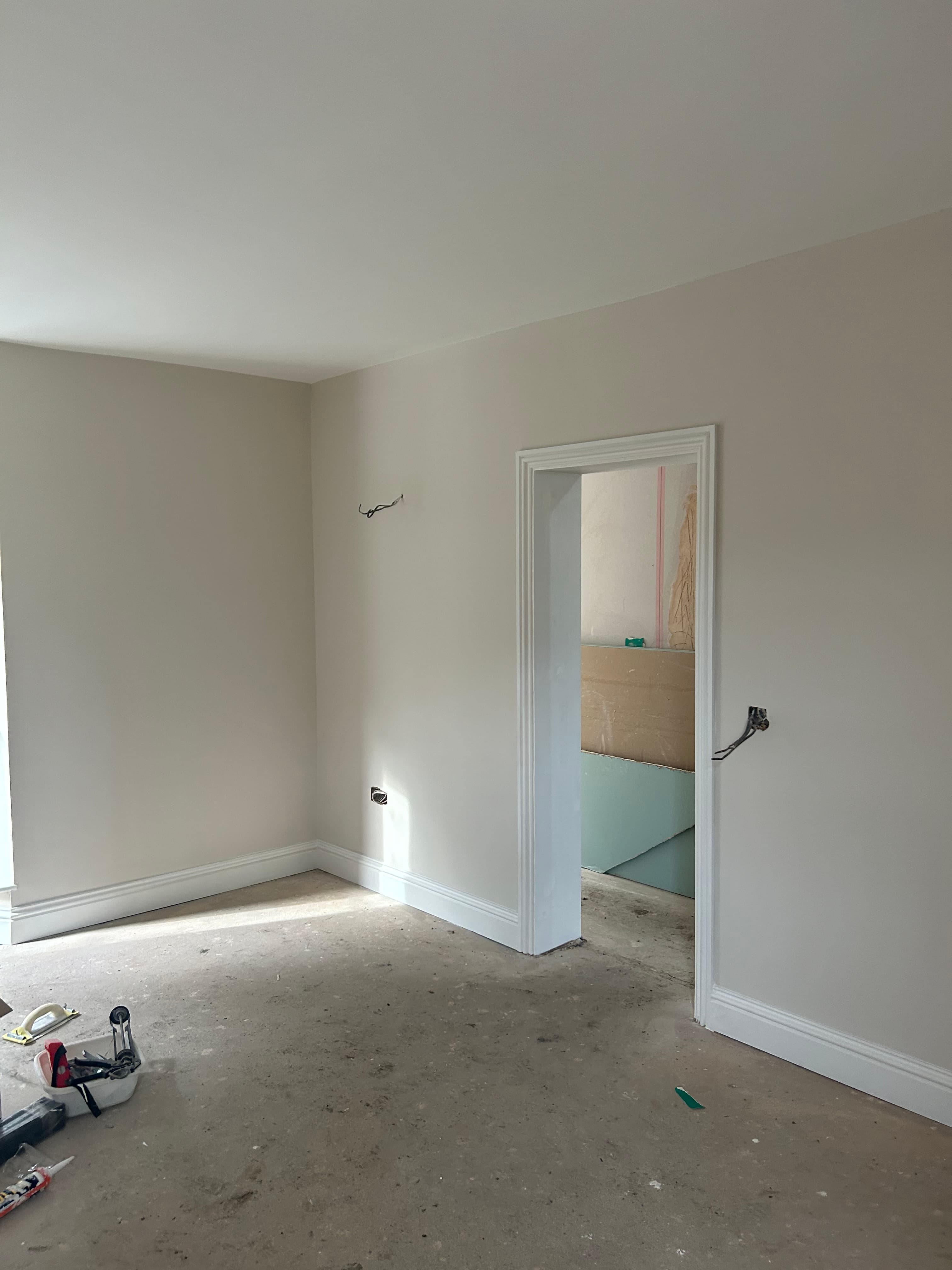 Renovated room with fresh plaster and coving
