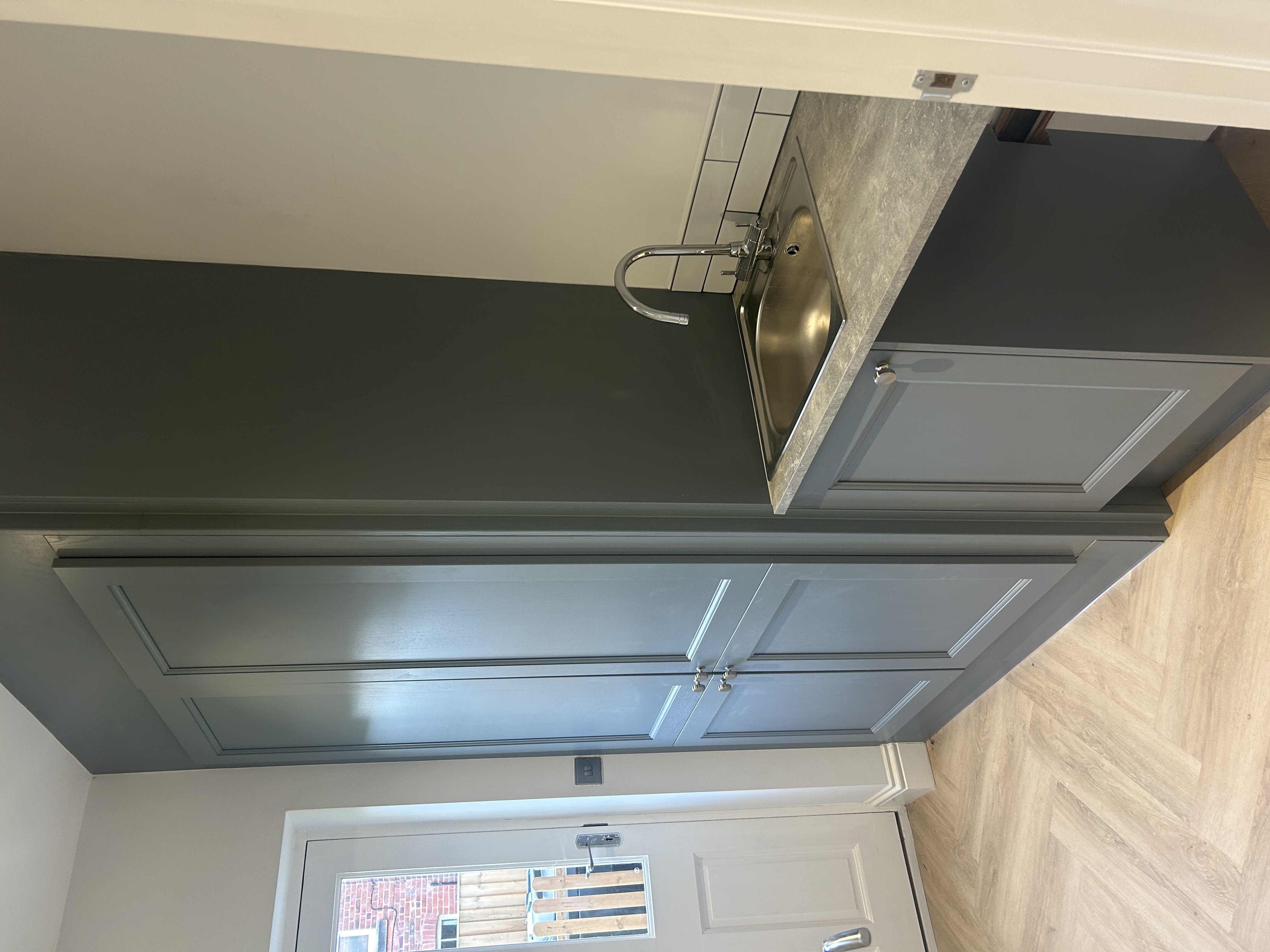 Kitchen worktop and window detail in a finished renovation