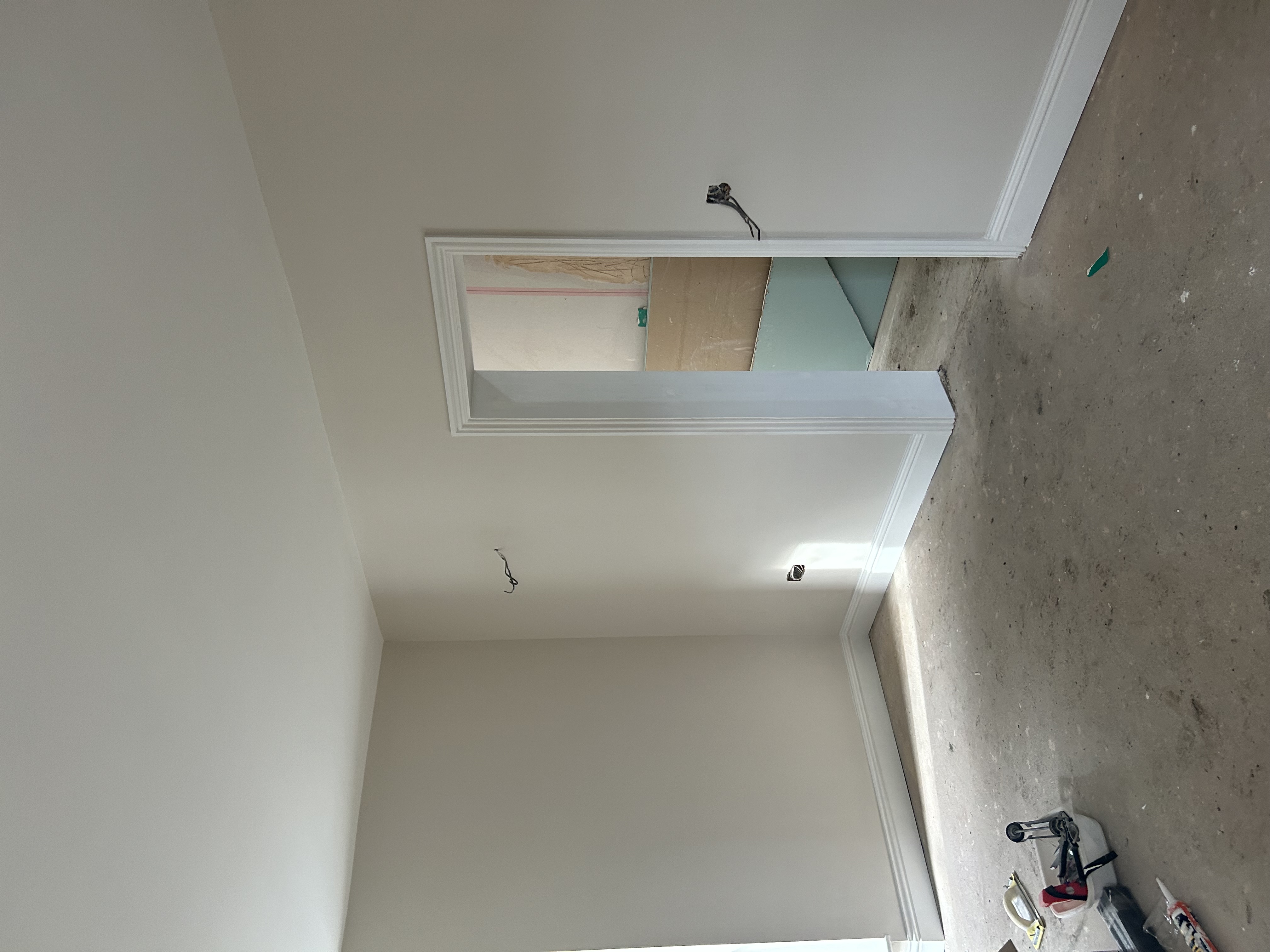 Renovated room with fresh plaster and coving
